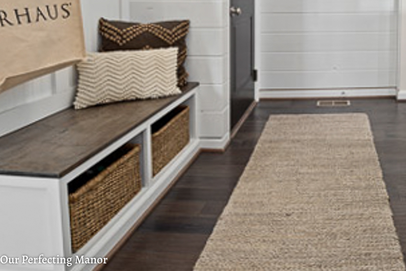 Mudroom with built in storage and shipap on the walls.