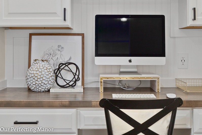 Planning desk with beadboard and a butcher block top.