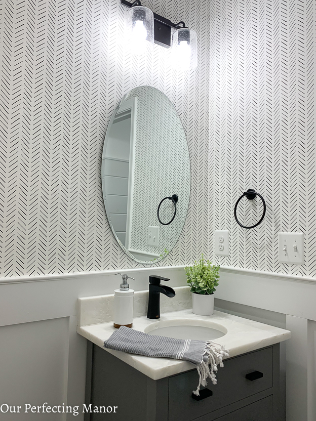 Waterfall faucet in powder room